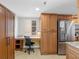 Kitchen featuring stainless appliances, desk nook and ample cabinet space at 19925 Gulf Blvd # 402, Indian Shores, FL 33785