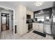 Cozy kitchen with modern appliances and a pass-through window at 202 S Hesperides St, Tampa, FL 33609