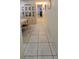 View of tiled dining area featuring an antique hutch and bright lighting at 2213 Fluorshire Dr, Brandon, FL 33511
