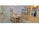 Comfortable dining room with seating for six and an antique hutch at 2213 Fluorshire Dr, Brandon, FL 33511