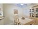 Comfortable dining room with seating for six and an antique hutch at 2213 Fluorshire Dr, Brandon, FL 33511