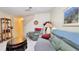 Comfortable living room with sofas, tile floors, and staircase in the background at 2213 Fluorshire Dr, Brandon, FL 33511