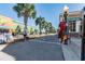 Lively downtown street scene with trees, shops, and local businesses at 2700 Bayshore Blvd # 522, Dunedin, FL 34698