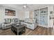 Comfortable living room with modern sofa and shelving at 2700 Bayshore Blvd # 522, Dunedin, FL 34698