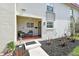 Inviting front porch with outdoor seating, and tiled floor perfect for enjoying the outdoors at 2700 Bayshore Blvd # 522, Dunedin, FL 34698