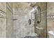 Modern shower with decorative tile and glass door at 2700 Bayshore Blvd # 522, Dunedin, FL 34698
