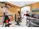 Home office features modern equipment and a view into another room at 3009 Banyan Hill Ln, Land O Lakes, FL 34639