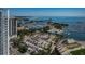 Aerial view of a waterfront community, showcasing the marina, parking, stadium, and lush landscaping at 301 1St S St # 3004, St Petersburg, FL 33701