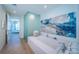 Modern bathroom boasting a glass shower, tub, and stylish contemporary design at 301 1St S St # 3004, St Petersburg, FL 33701
