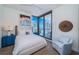Bright bedroom with city views, stylish furniture, and natural light at 301 1St S St # 3004, St Petersburg, FL 33701
