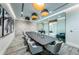 Spacious conference room featuring modern lighting, sleek table, comfortable seating, and decorative wall art at 301 1St S St # 3004, St Petersburg, FL 33701