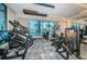 Bright fitness center with ocean views, featuring treadmills, weights, and fitness equipment, promoting a healthy lifestyle at 301 1St S St # 3004, St Petersburg, FL 33701