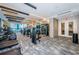 Well-equipped fitness center with modern machines, mirrored walls, and natural light, promoting a healthy lifestyle at 301 1St S St # 3004, St Petersburg, FL 33701