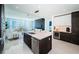 Contemporary kitchen with island, stainless steel appliances, and an open floor plan at 301 1St S St # 3004, St Petersburg, FL 33701