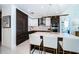 Gourmet kitchen with a large island, bar seating, and stainless steel appliances at 301 1St S St # 3004, St Petersburg, FL 33701