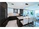 Open concept kitchen with large island, stainless appliances, and views into living space at 301 1St S St # 3004, St Petersburg, FL 33701