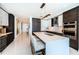 Modern kitchen with a large island, white countertops, and stainless steel appliances at 301 1St S St # 3004, St Petersburg, FL 33701