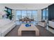 Bright and airy living room featuring large windows with stunning city views at 301 1St S St # 3004, St Petersburg, FL 33701