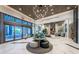 The luxury lobby boasts stylish decor, a chic seating area, and expansive windows providing ample natural light at 301 1St S St # 3004, St Petersburg, FL 33701