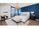Stylish main bedroom with floor-to-ceiling windows and a decorative light fixture at 301 1St S St # 3004, St Petersburg, FL 33701