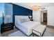 Luxurious bedroom suite features a coastal view from a wall of large windows at 301 1St S St # 3004, St Petersburg, FL 33701