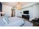 Bright bedroom with contemporary design and a partial view of the en suite bathroom at 301 1St S St # 3004, St Petersburg, FL 33701