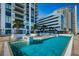 Luxury high-rise pool and lounge area with views of the adjacent buildings at 301 1St S St # 3004, St Petersburg, FL 33701