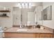 Bathroom vanity featuring granite countertops, ample storage space, and white cabinets at 30723 Reed Rd, Dade City, FL 33523