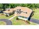 Stunning single-story home with a beautifully landscaped yard, circular driveway, and grand entrance at 30723 Reed Rd, Dade City, FL 33523