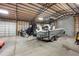 Large garage featuring boat, ATV, and plenty of space at 30723 Reed Rd, Dade City, FL 33523