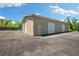 Spacious detached garage offering ample storage and parking at 30723 Reed Rd, Dade City, FL 33523