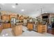 Gourmet kitchen with stainless steel appliances and custom wood cabinets at 30723 Reed Rd, Dade City, FL 33523