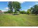 Expansive grassy land with mature trees, perfect for building your dream home at 30723 Reed Rd, Dade City, FL 33523