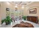 Bright living room with tile floors, plenty of light, and a view to the lanai at 30723 Reed Rd, Dade City, FL 33523