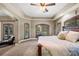 Relaxing main bedroom with a lounging area and a view of the pool at 30723 Reed Rd, Dade City, FL 33523