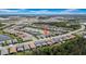 Overhead shot showing homes nestled in a serene setting of lakes and parks at 3096 Great Banyan Way, Wesley Chapel, FL 33543