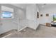 Hallway featuring carpet flooring, a large closet, and decor on the wall, illuminated by recessed lighting at 3096 Great Banyan Way, Wesley Chapel, FL 33543