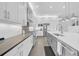 Updated kitchen with stainless appliances, granite countertops and a center island at 3096 Great Banyan Way, Wesley Chapel, FL 33543