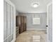 Bright bedroom boasts ample storage and a closet at 3210 E Maritana Dr, St Pete Beach, FL 33706