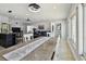 Inviting living space with an open layout to the kitchen, with dining and living at 3210 E Maritana Dr, St Pete Beach, FL 33706