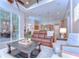 Living room area with comfortable seating and a view into the kitchen at 3212 Sunset Lakes Blvd, Land O Lakes, FL 34638