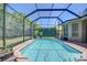 Enjoy the outdoors with this screened-in pool and brick-paved patio area for entertainment at 3212 Sunset Lakes Blvd, Land O Lakes, FL 34638