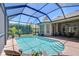 Outdoor living with a large screened-in pool, patio, and outdoor kitchen area at 3212 Sunset Lakes Blvd, Land O Lakes, FL 34638
