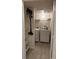 Laundry room with washer, dryer and shelving at 402 S Armenia Ave # 127, Tampa, FL 33609