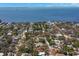 Discover this charming neighborhood from above, close to the beautiful bay waters at 407 Indiana Ave, Crystal Beach, FL 34681