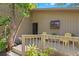 Relaxing porch with comfortable seating, providing a welcoming outdoor space at 407 Indiana Ave, Crystal Beach, FL 34681