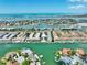 Expansive aerial view of waterfront community with boat docks and stunning water views at 455 Pinellas Bayway S # 3B, Tierra Verde, FL 33715