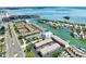 Aerial shot of condos with community pool, boat docks, and easy access to waterfront at 455 Pinellas Bayway S # 3B, Tierra Verde, FL 33715
