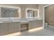 Spa-like bathroom featuring double sinks, illuminated mirrors, and a luxurious marble-tiled shower at 455 Pinellas Bayway S # 3B, Tierra Verde, FL 33715