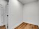 Bedroom with white trim and luxury vinyl plank flooring at 455 Pinellas Bayway S # 3B, Tierra Verde, FL 33715